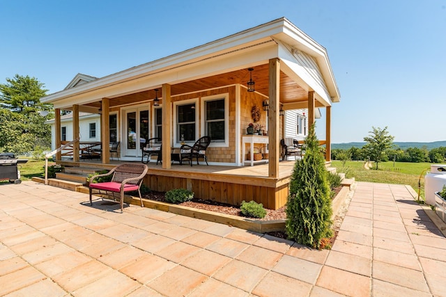 view of patio featuring a porch