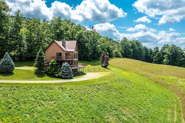 view of yard with a wooden deck