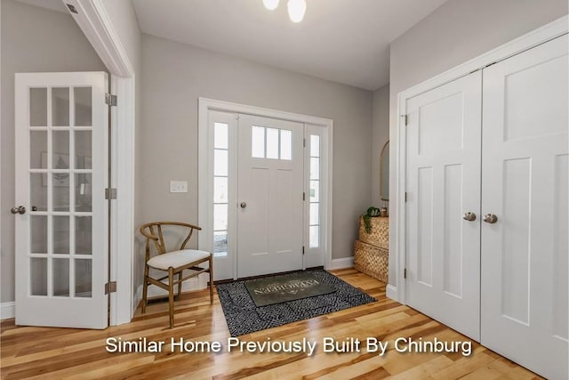 foyer featuring hardwood / wood-style flooring