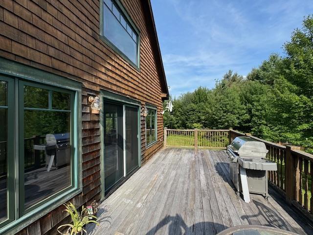 wooden terrace with grilling area