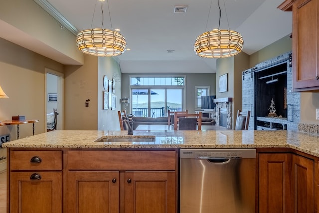 kitchen featuring a sink, visible vents, open floor plan, dishwasher, and brown cabinetry