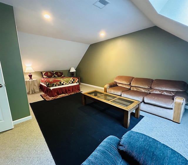 living room with baseboards, visible vents, vaulted ceiling, and carpet flooring