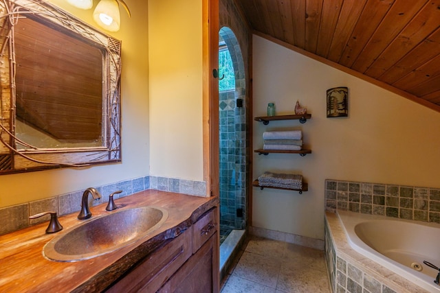 full bathroom with a stall shower, lofted ceiling, wooden ceiling, a jetted tub, and vanity