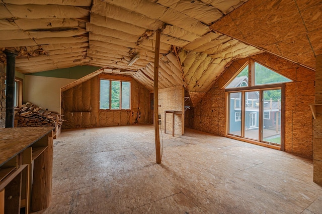 attic featuring a healthy amount of sunlight