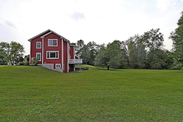 view of yard featuring a wooden deck