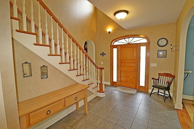 foyer entrance featuring tile patterned flooring