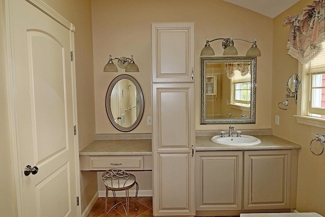 bathroom featuring vanity and tile patterned flooring