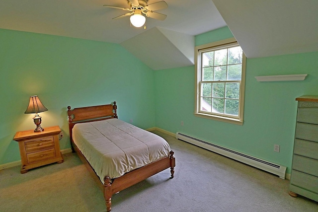 bedroom featuring a baseboard radiator, vaulted ceiling, light colored carpet, and ceiling fan