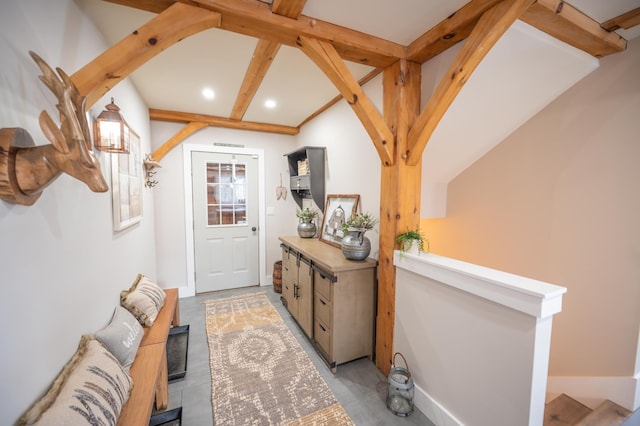 entryway with vaulted ceiling