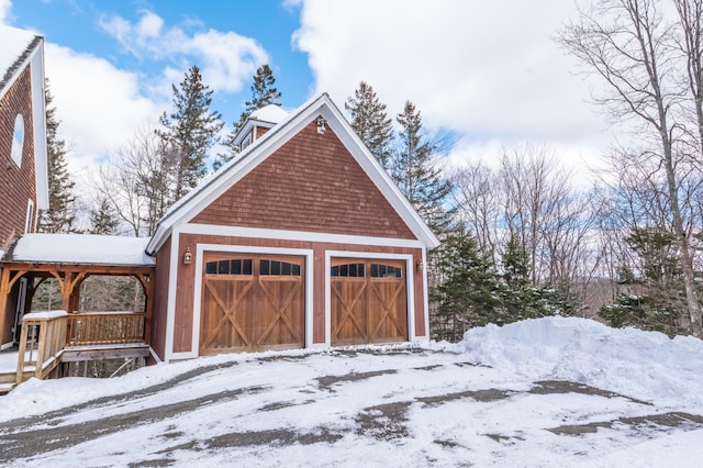 view of snow covered garage