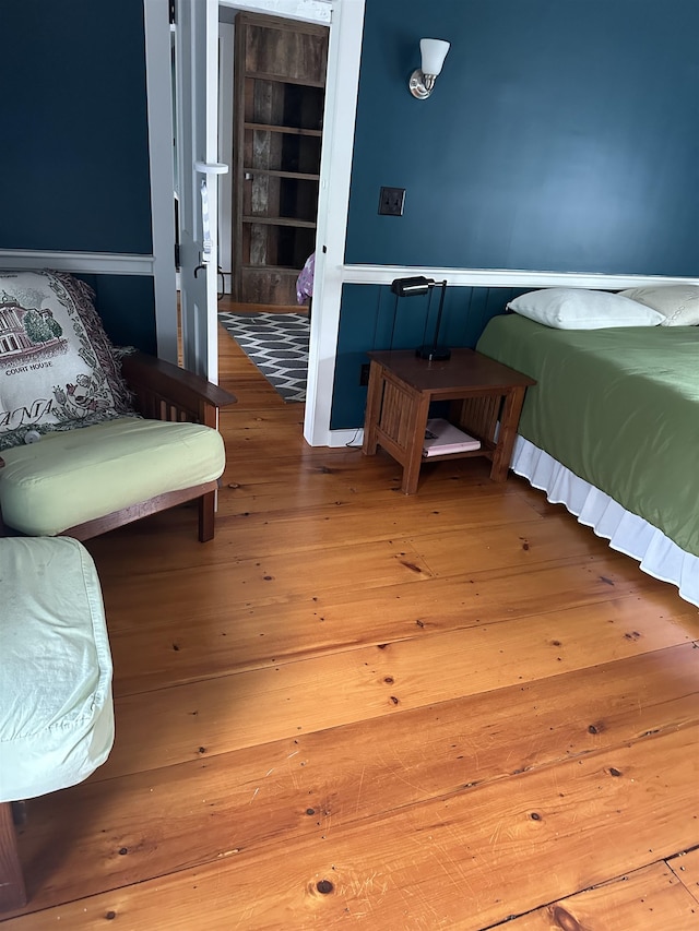 bedroom featuring wood-type flooring