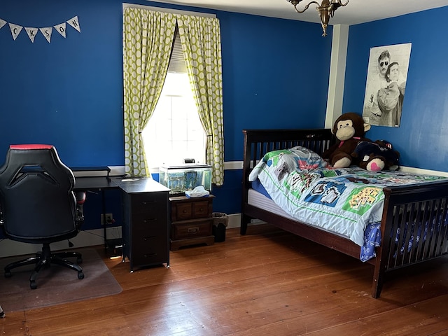 bedroom featuring hardwood / wood-style floors