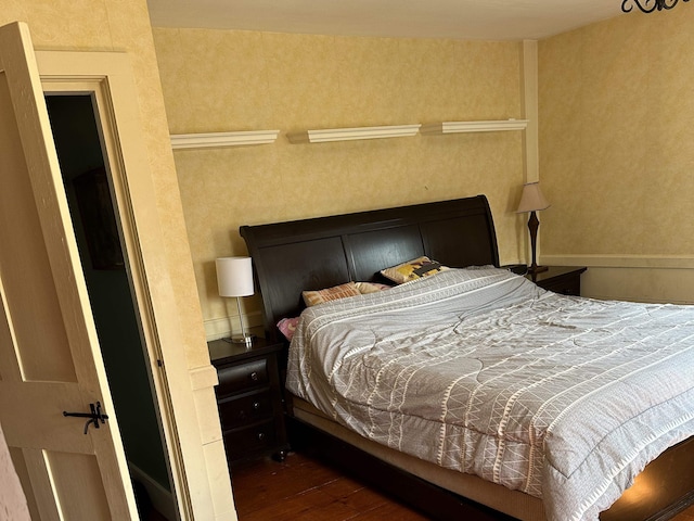 bedroom with wood-type flooring