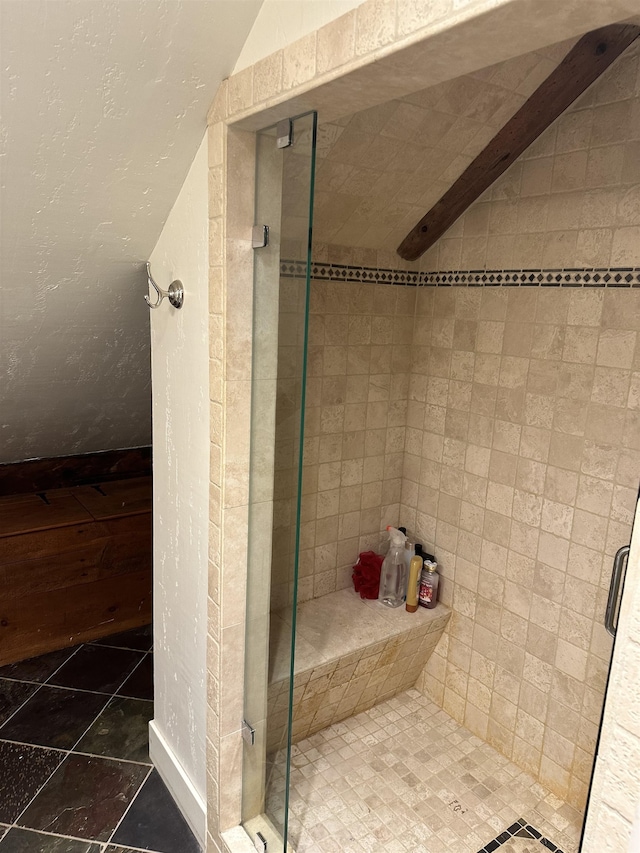 bathroom featuring an enclosed shower