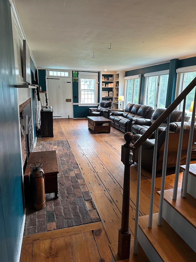 living room featuring a fireplace and dark hardwood / wood-style flooring