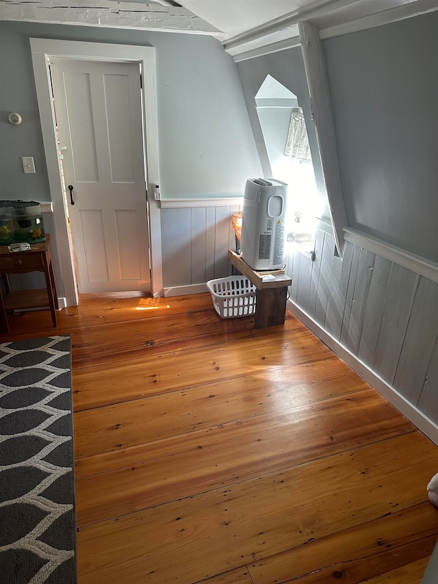 staircase featuring hardwood / wood-style flooring