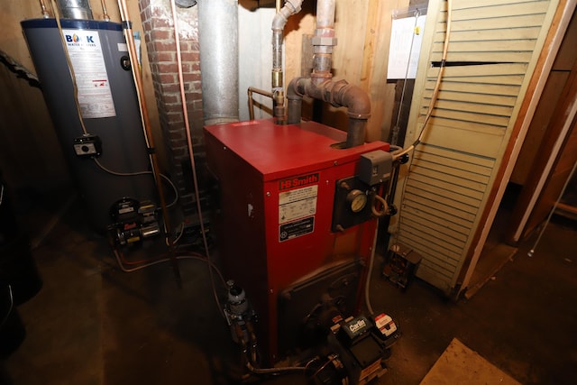 utility room featuring gas water heater