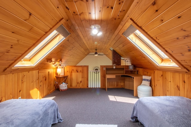 carpeted bedroom with wood ceiling, wooden walls, and lofted ceiling with skylight