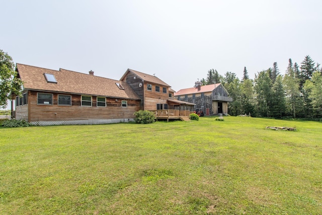 view of yard featuring a deck