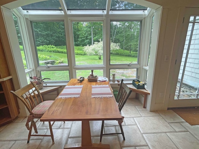 sunroom featuring a wealth of natural light