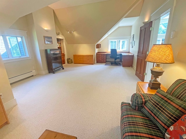 interior space featuring carpet flooring, a baseboard radiator, and lofted ceiling