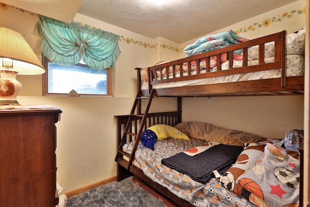 bedroom with a textured ceiling