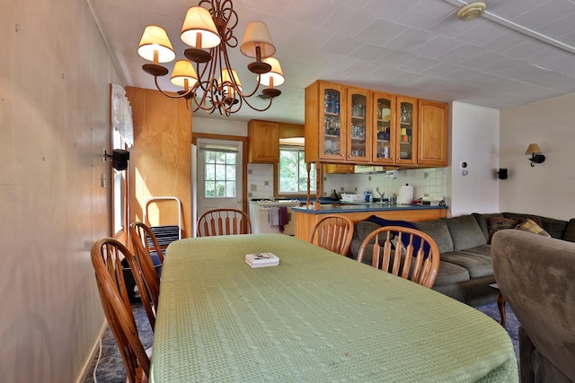 dining area with a chandelier