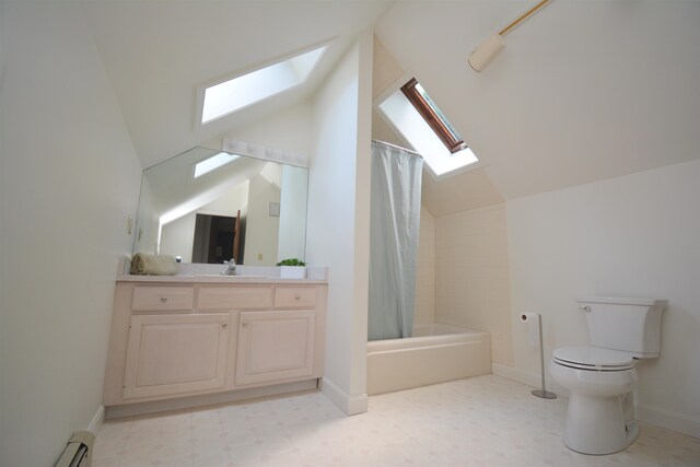 full bathroom featuring vaulted ceiling with skylight, shower / bathtub combination with curtain, baseboard heating, vanity, and toilet