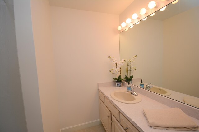 bathroom featuring vanity and tile patterned flooring