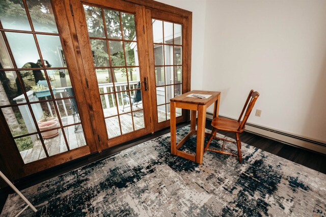 dining space featuring hardwood / wood-style flooring