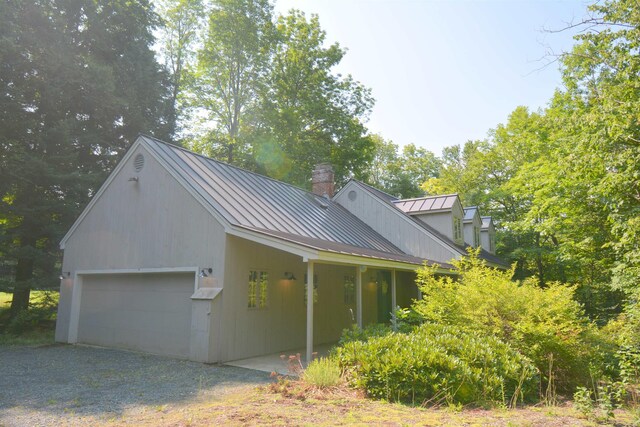 view of side of home featuring a deck