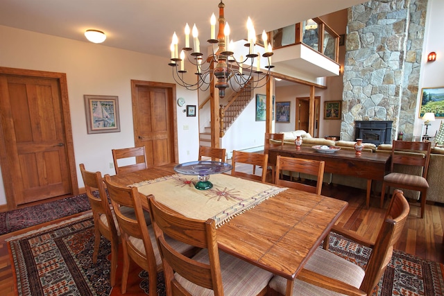 dining area with a notable chandelier and wood-type flooring