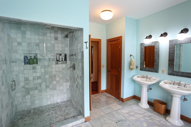 bedroom with a baseboard heating unit and carpet flooring