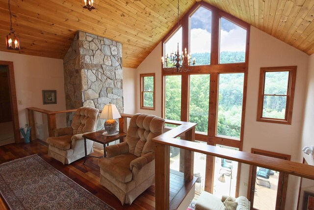 bedroom with a baseboard heating unit, crown molding, light colored carpet, and ceiling fan