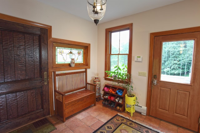 entryway with a baseboard radiator