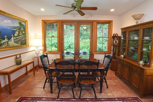 dining space featuring ceiling fan