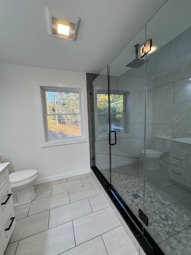 full bath featuring a stall shower, vanity, and visible vents