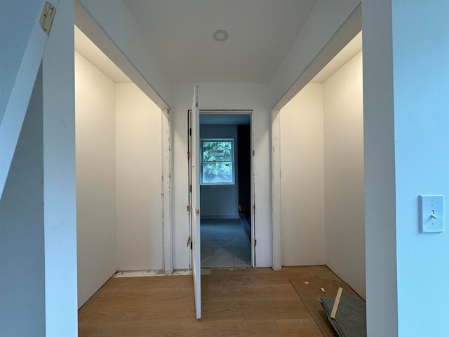 hallway featuring light wood-type flooring