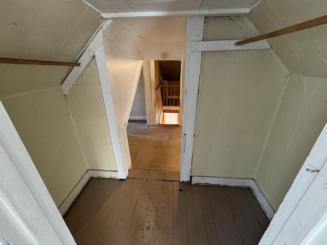 interior space featuring vaulted ceiling and hardwood / wood-style flooring