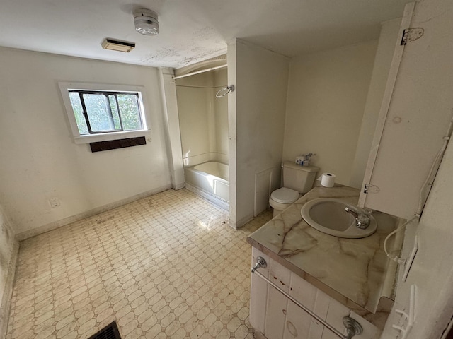 full bath featuring tile patterned floors, baseboards, toilet, and vanity