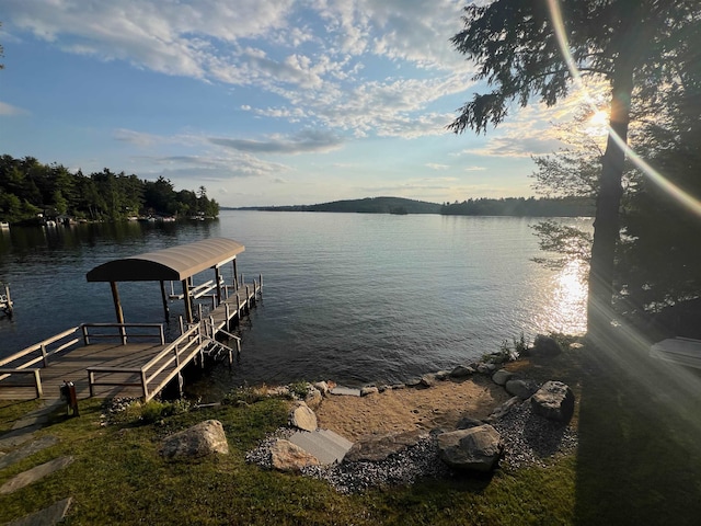 view of dock with a water view