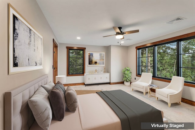 carpeted bedroom with ceiling fan