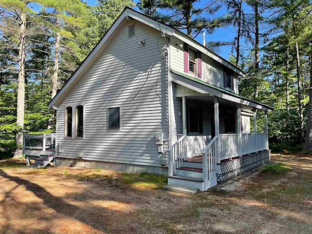view of home's exterior with covered porch