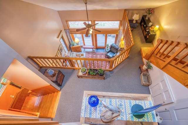 stairs with ceiling fan