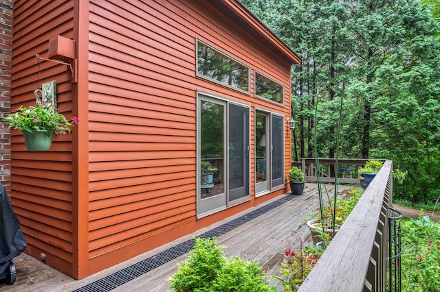 view of home's exterior with a deck