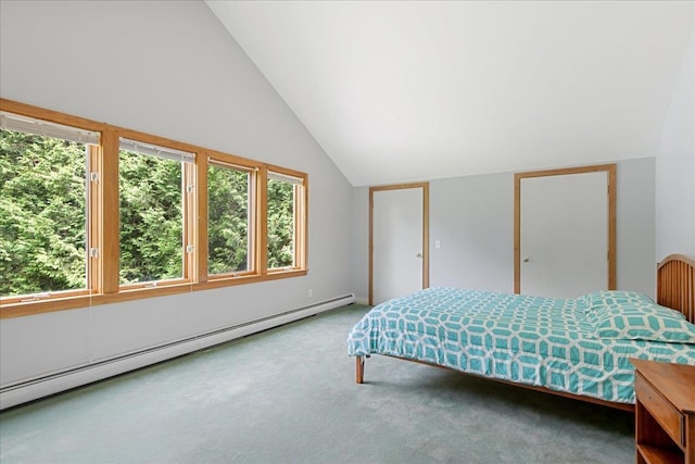 bedroom featuring baseboard heating, vaulted ceiling, and carpet floors