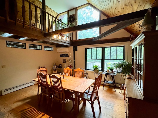 dining room with light hardwood / wood-style floors, an AC wall unit, a baseboard heating unit, and high vaulted ceiling