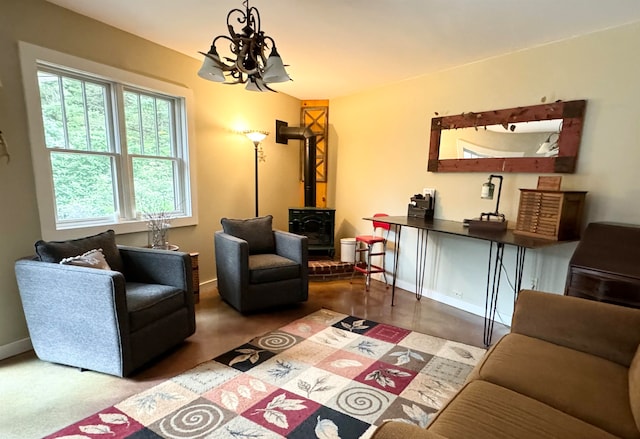 living room featuring a wood stove and a healthy amount of sunlight