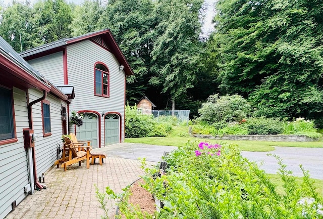 exterior space featuring a garage