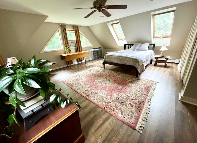 bedroom featuring lofted ceiling, wood-type flooring, and ceiling fan